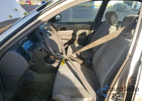 1997 Toyota Corolla Base z USA, uszkodzony, nr VIN 1NXBA02E7VZ664788